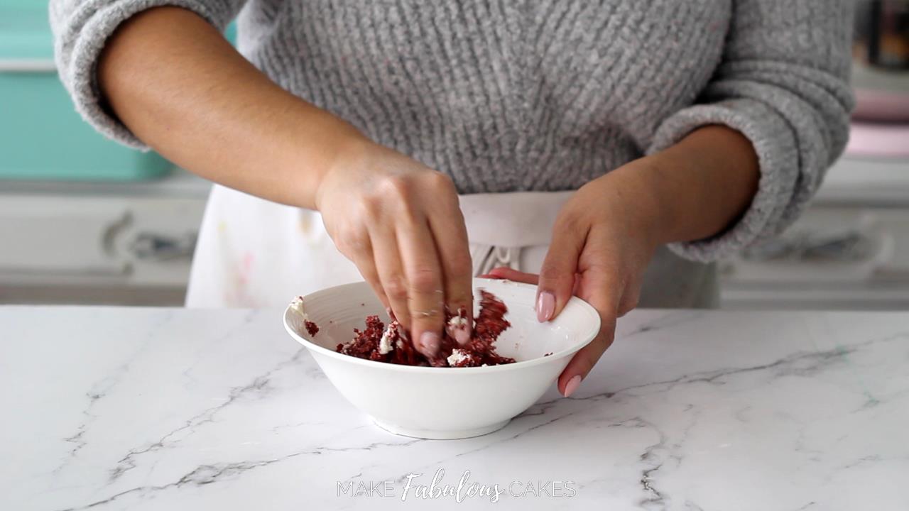 mashing cake scraps to build the mushroom cake