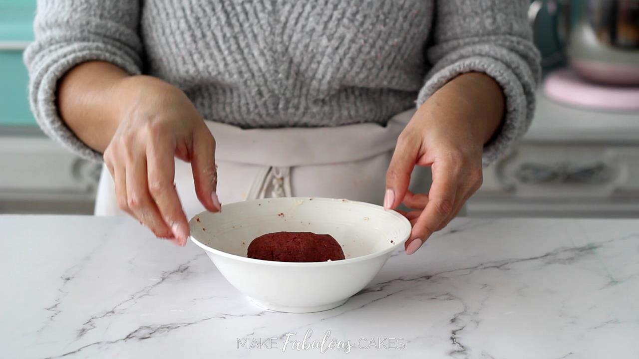 mashing cake scraps to build the mushroom cake