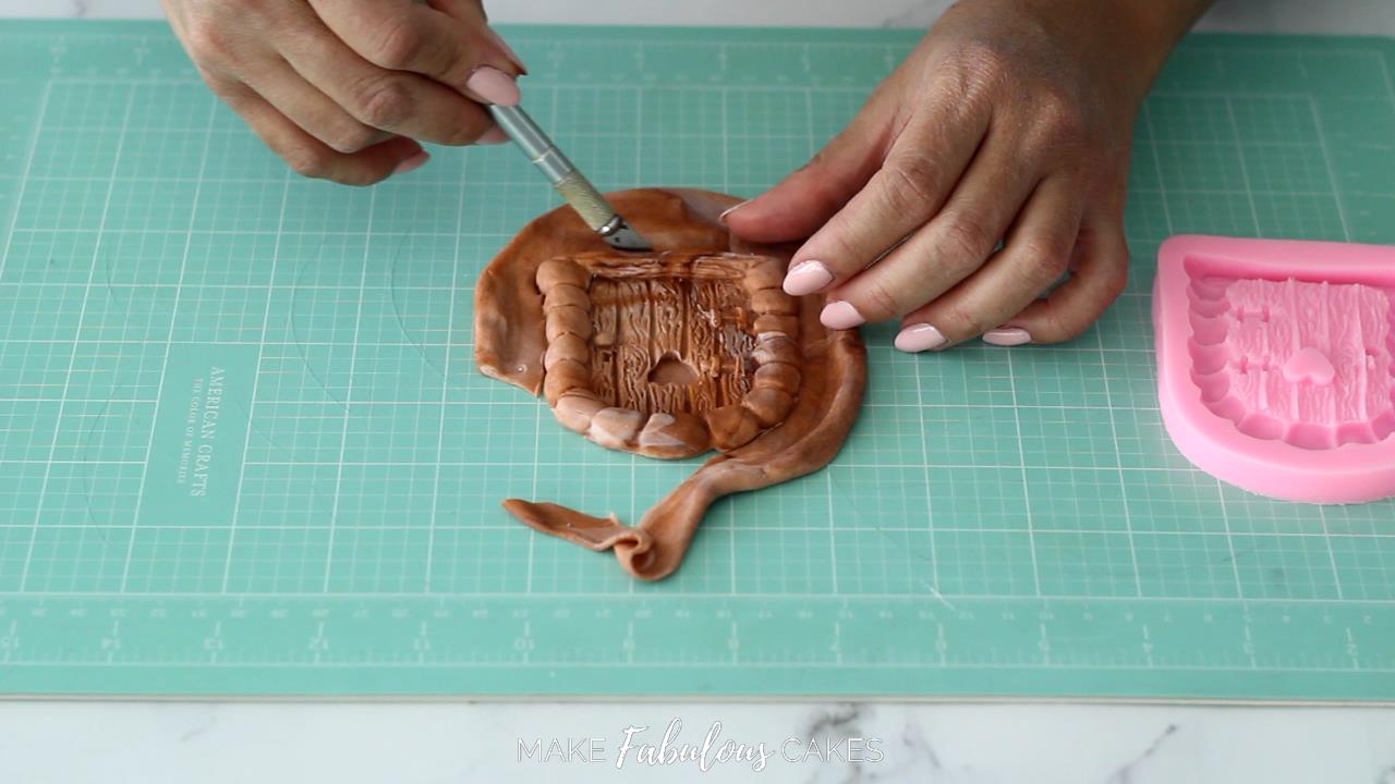 cut excess fondant with craft knife