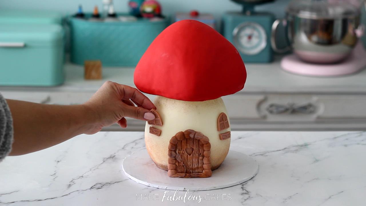 adding doors and windows on the mushroom birthday cake